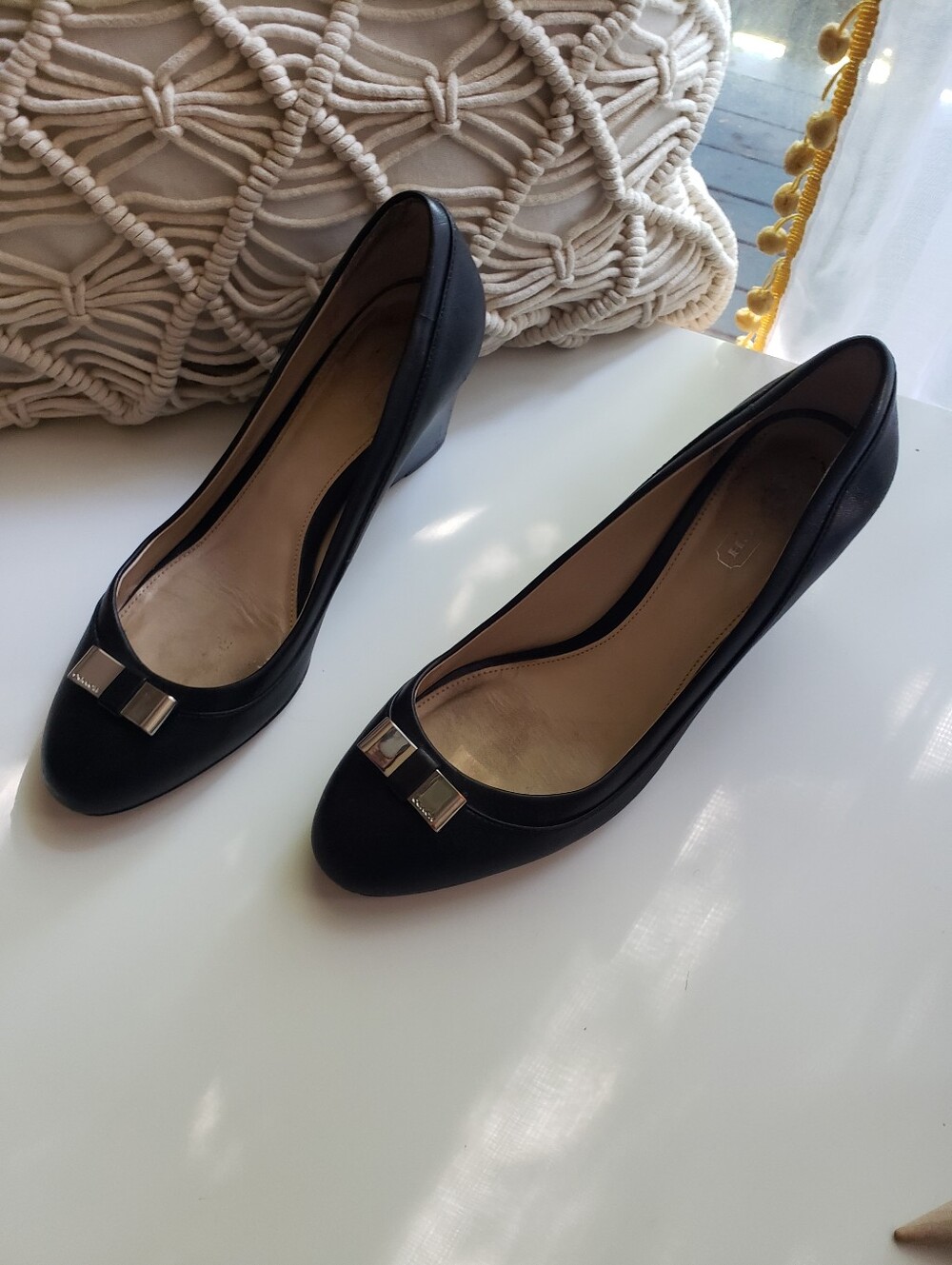 Coach Black Flats with Gold-Tone Bow Accent